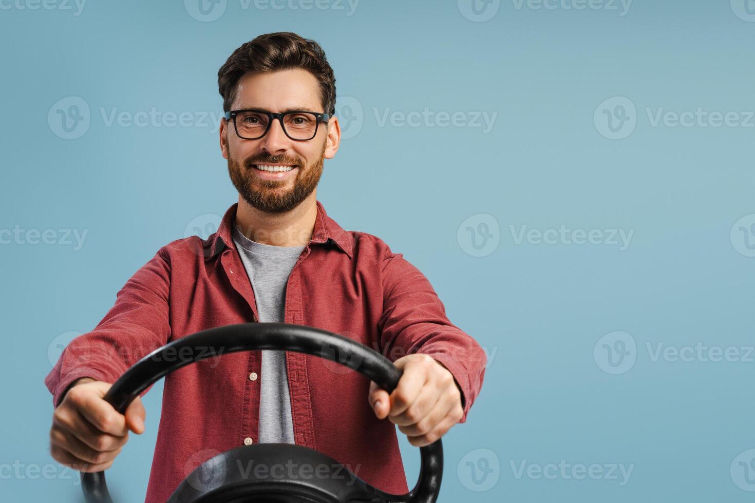 Portrait of handsome, positive, happy Hispanic man wearing stylish eyeglasses, holding helm photo