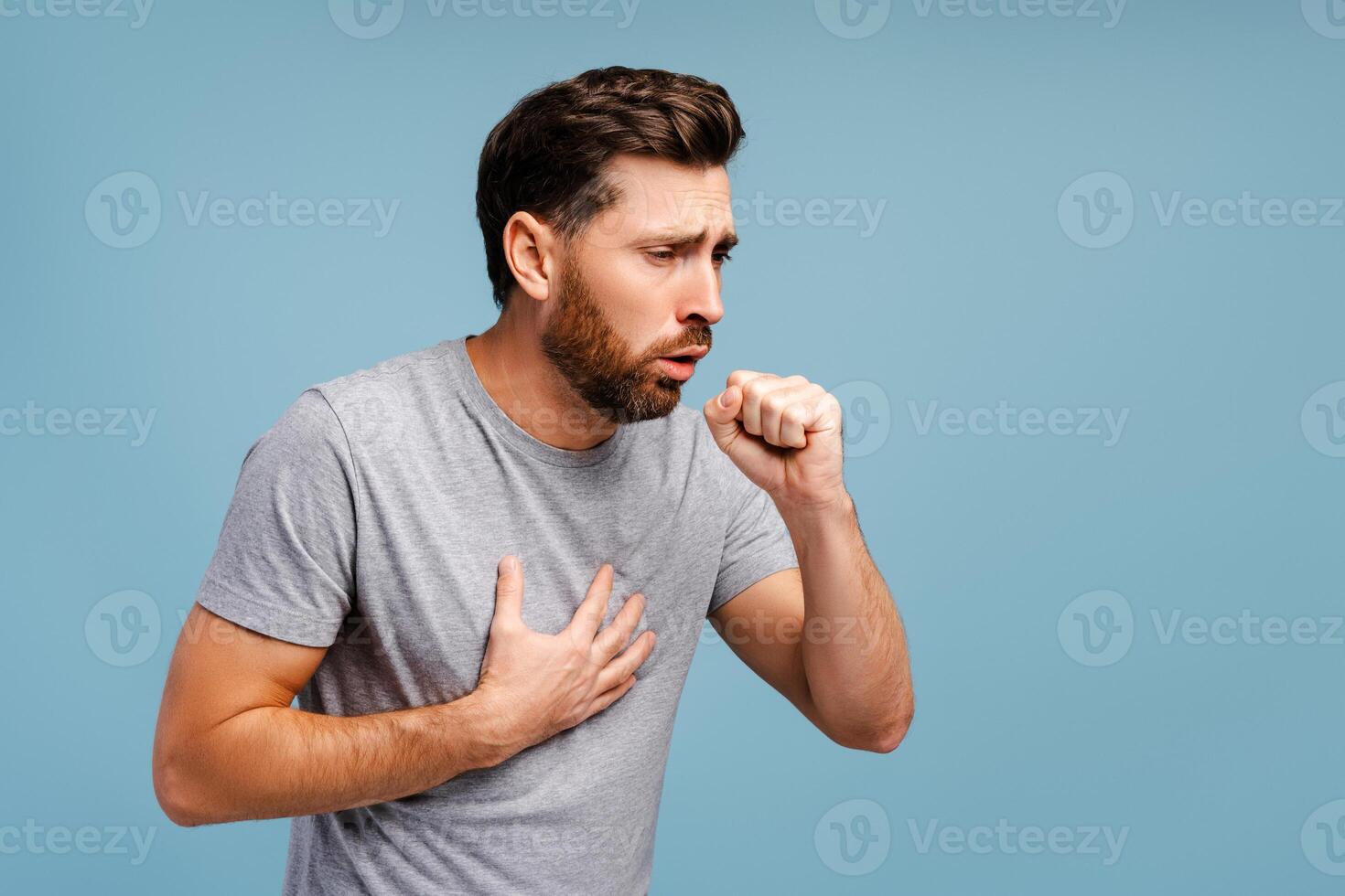 Portrait of sick, upset Hispanic man cough, having virus, cold. Treatment, health care concept photo