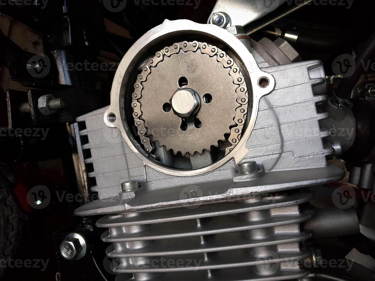 Motor Bike Engine Head - Timing Chain Closup photo