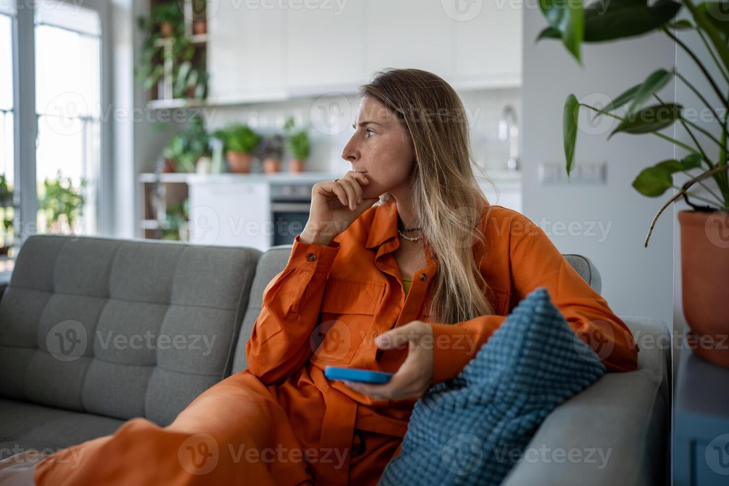 Thoughtful woman looking in distance think about problems lost in thoughts, consider life troubles. photo