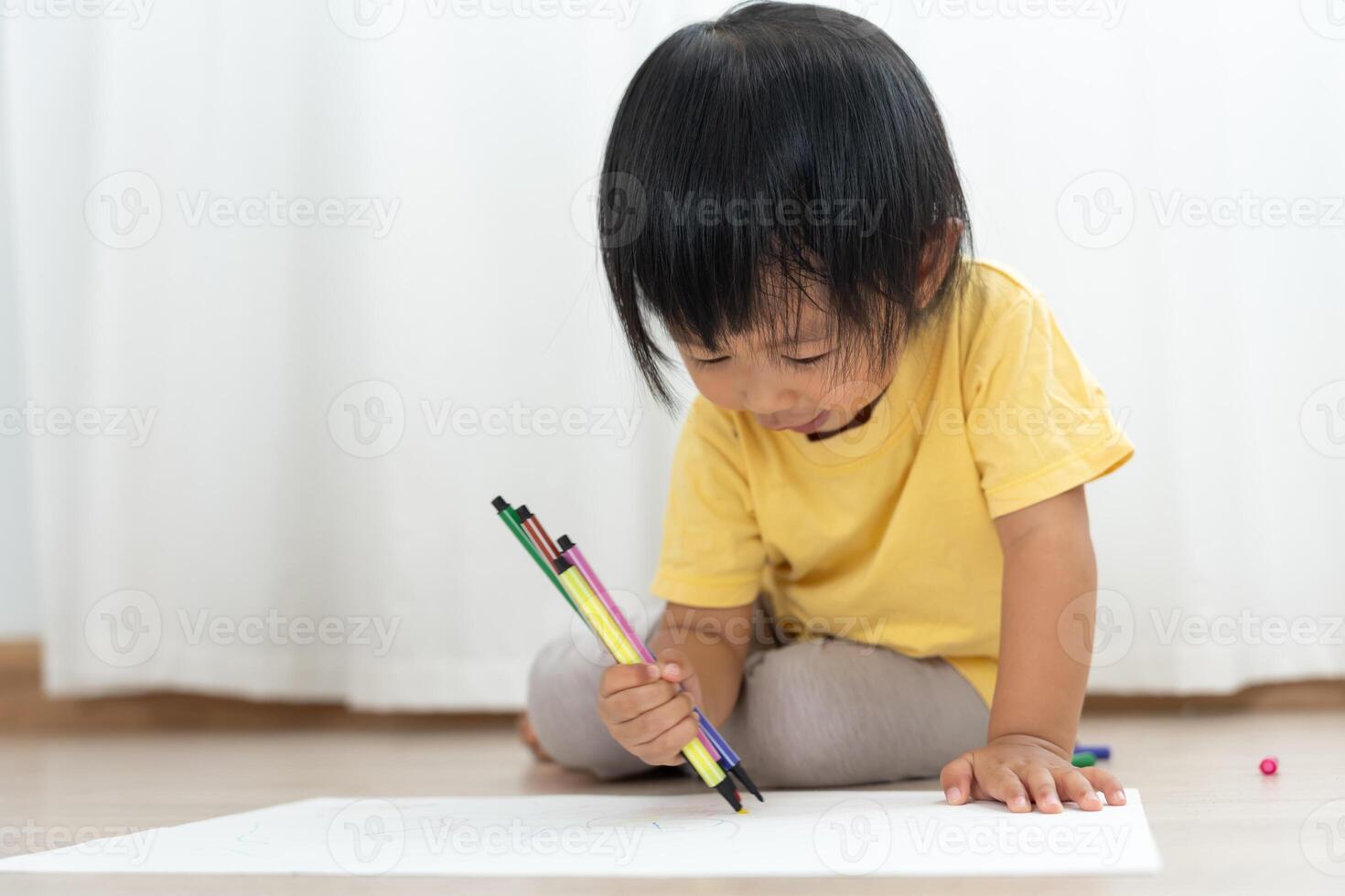 Happy Asia children playing learning paint on paper. Activity, development, IQ, EQ, meditation, brain, muscles, essential skills, family having fun spending time together. Holiday photo
