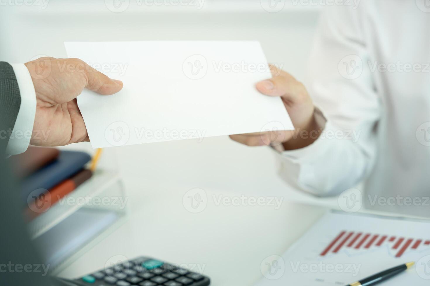 Businessmen receive salary or bonuses from management or Boss. Company give rewards to encourage work. Smiling businessman enjoying a reward at the desk in the office. photo