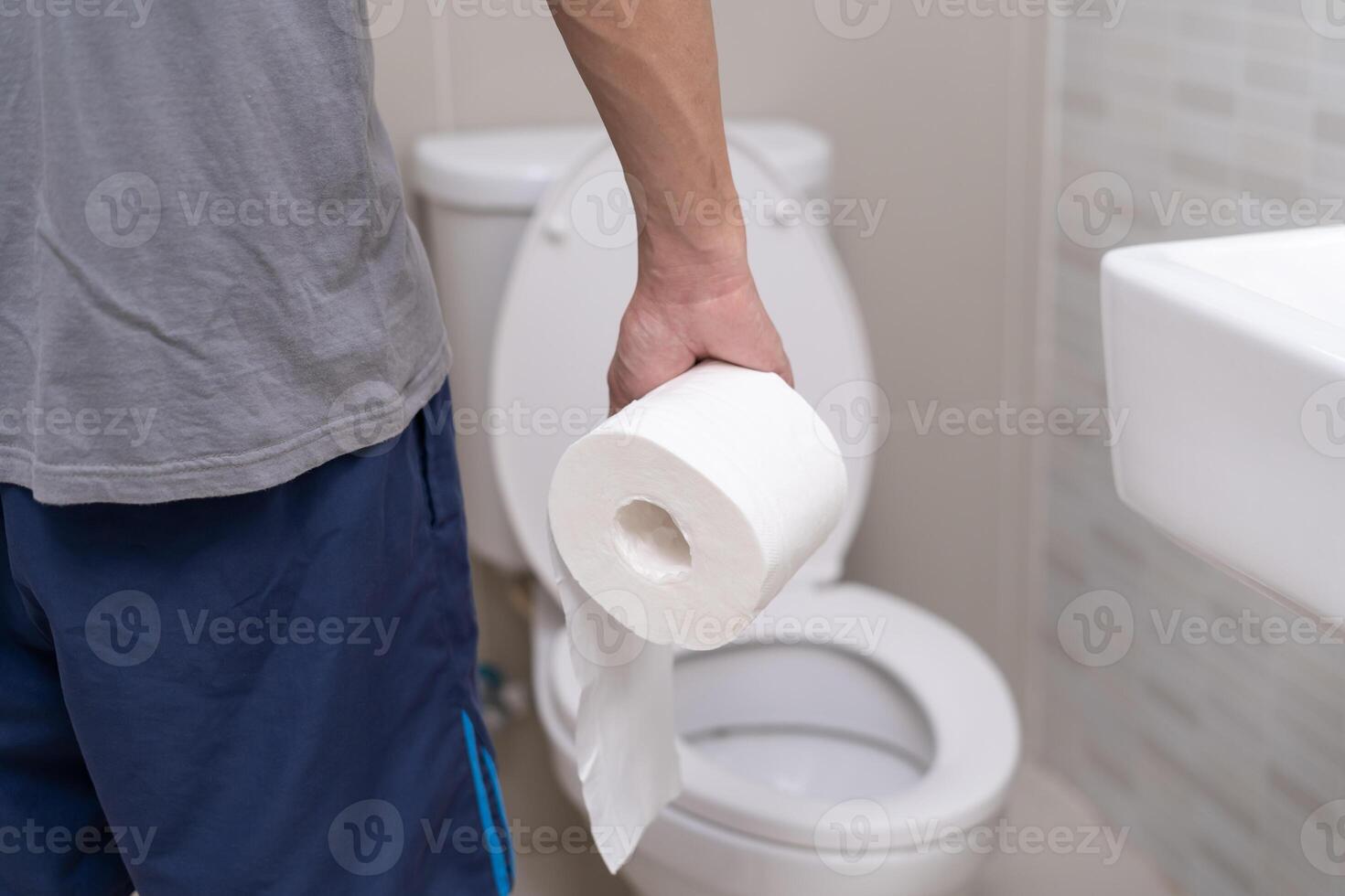 Constipation and diarrhea in bathroom. Hurt man touch belly stomach ache painful. colon inflammation problem, toxic food, abdominal pain, abdomen, constipated in toilet, stomachache, Hygiene photo