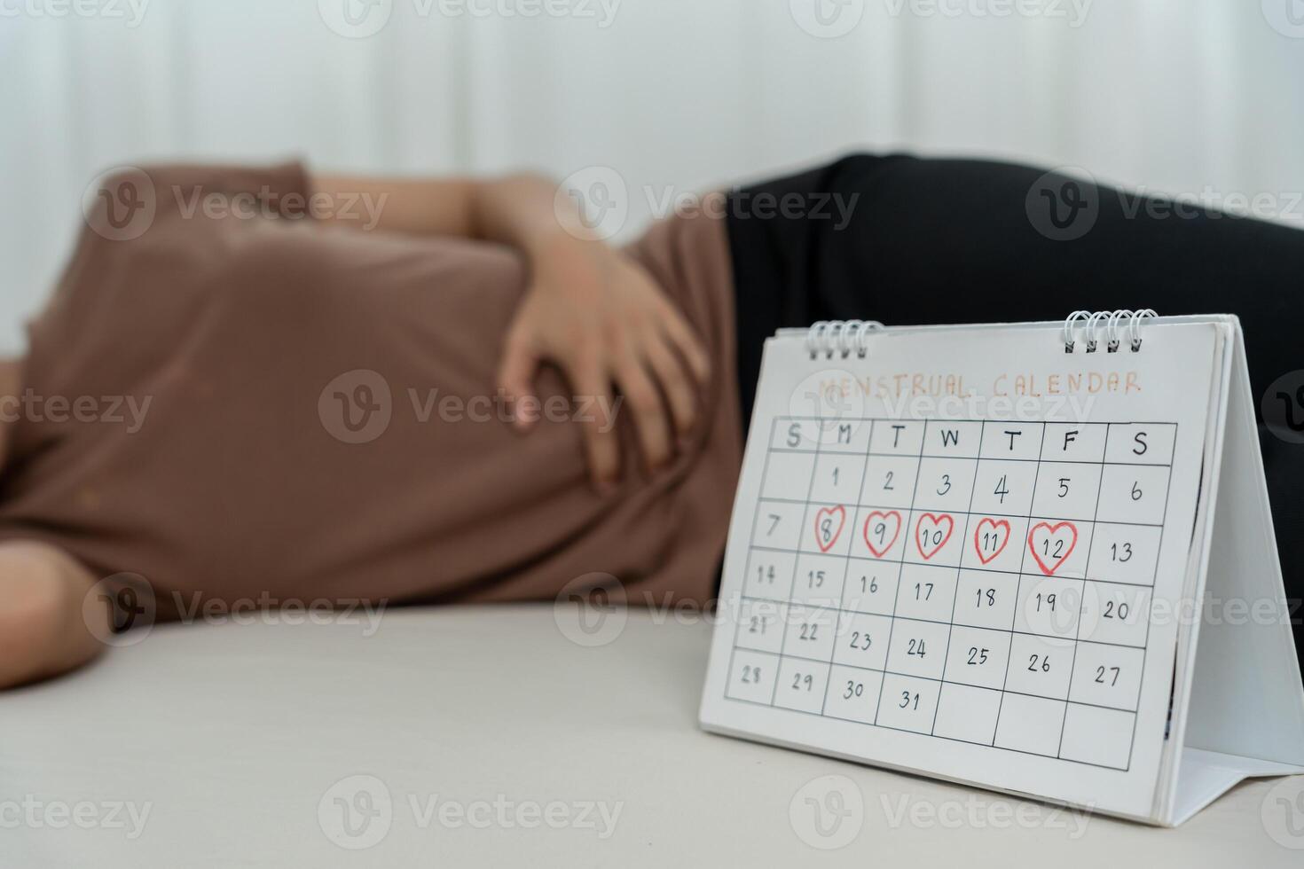 stomach ache. Asian women have abdominal pain, indigestion, gastritis, menstrual cramps, flatulence, diarrhea, distention, colon cancer, belly inflammation problem, suffer food poisoning, abdomen photo