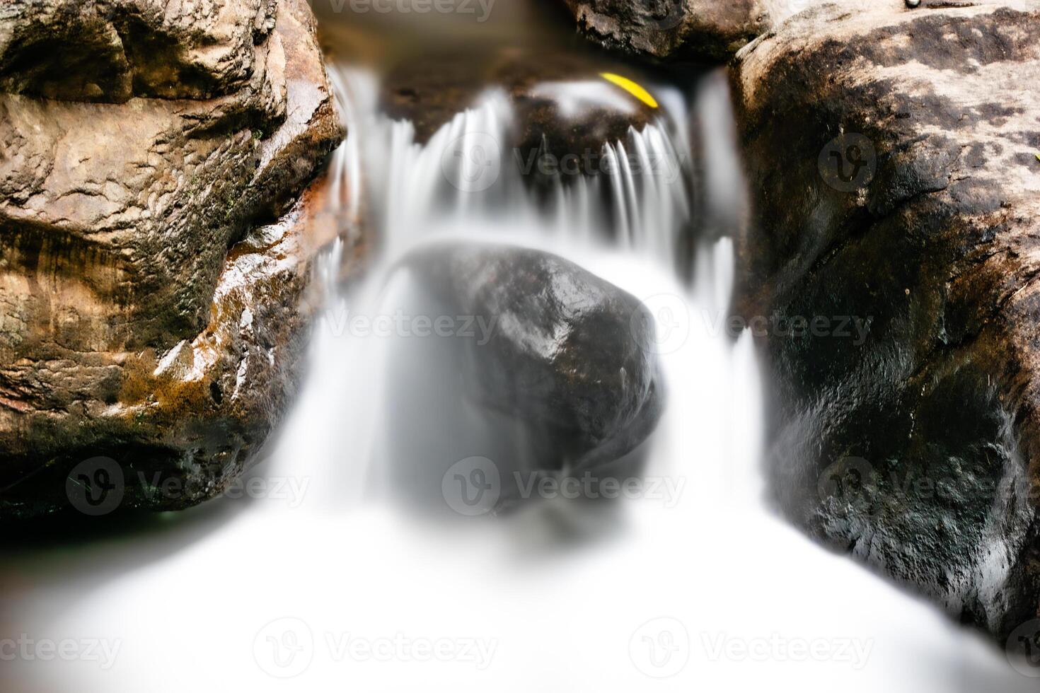 Dreamy photo of river stream flowing over rocks. Beautiful landscape of mountain river.