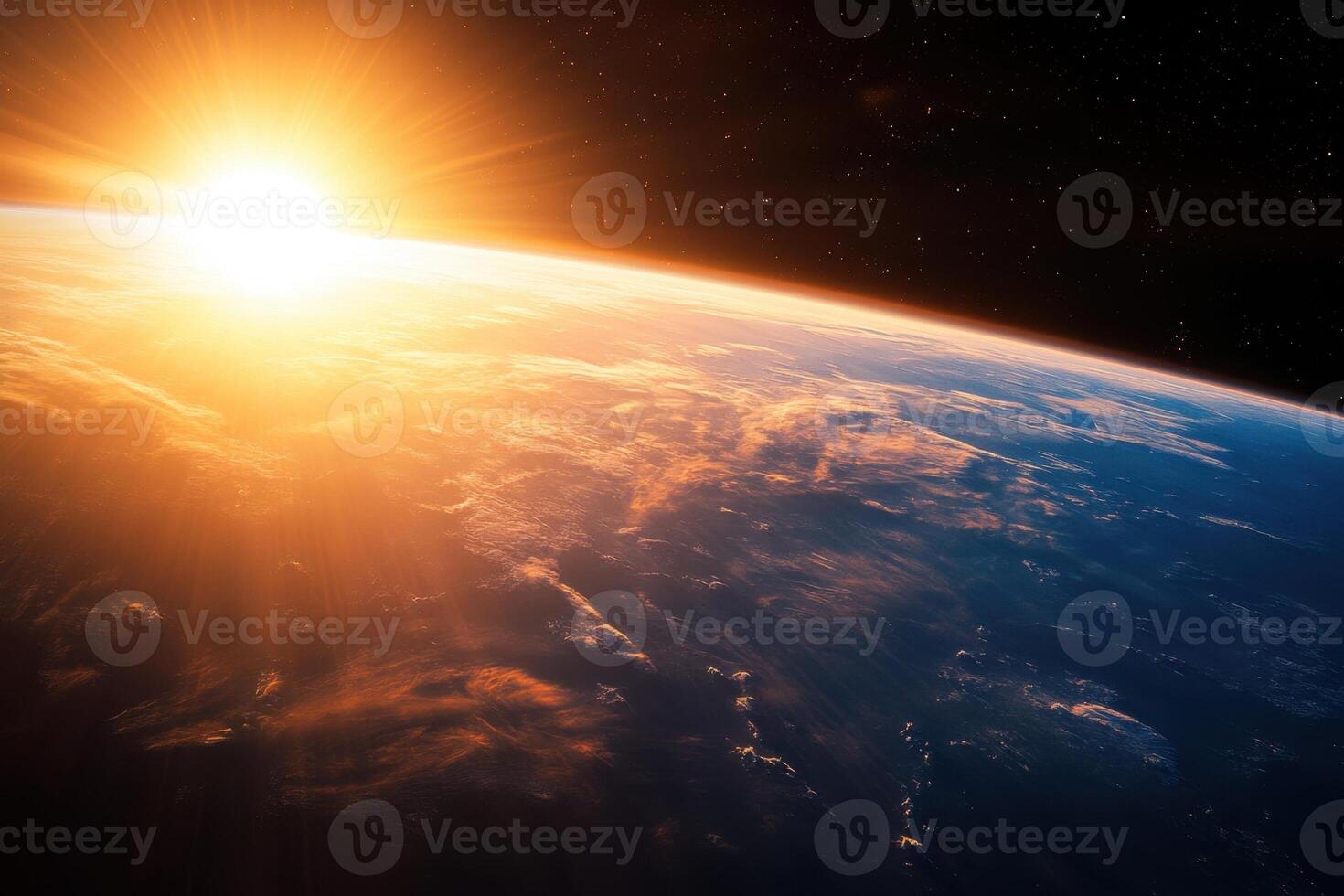 Sunrise over Earth from space, showing clouds and a bright sun. photo
