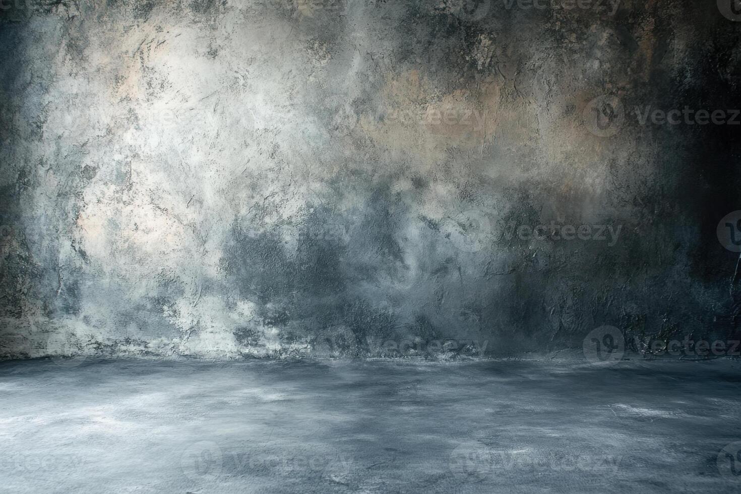 A dark, textured concrete wall with a spotlight. photo