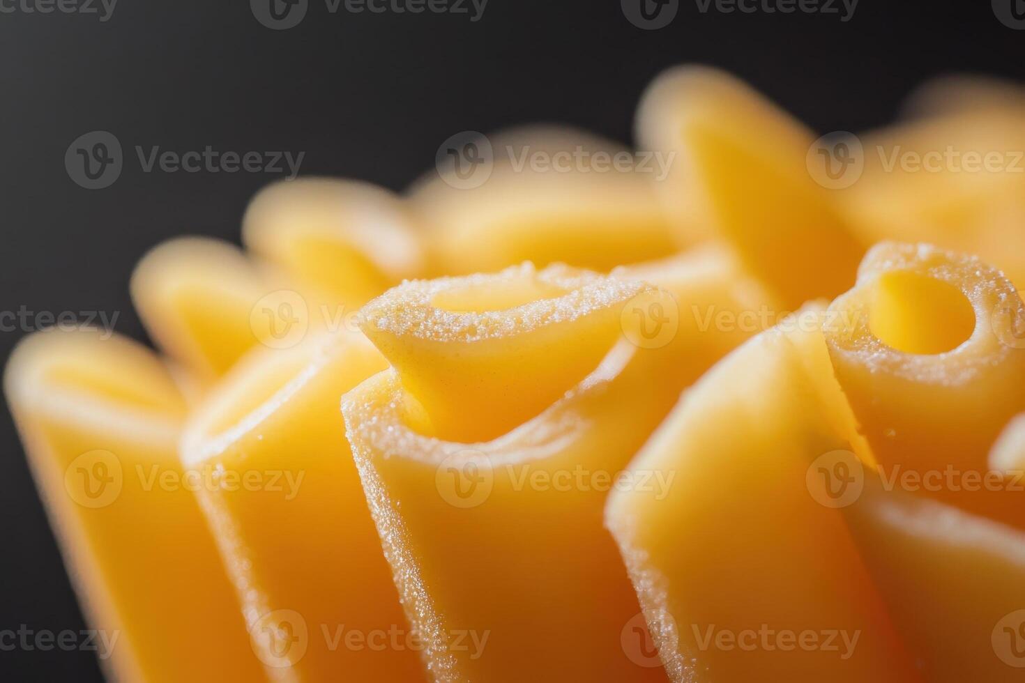 Close-up of uncooked penne pasta. photo