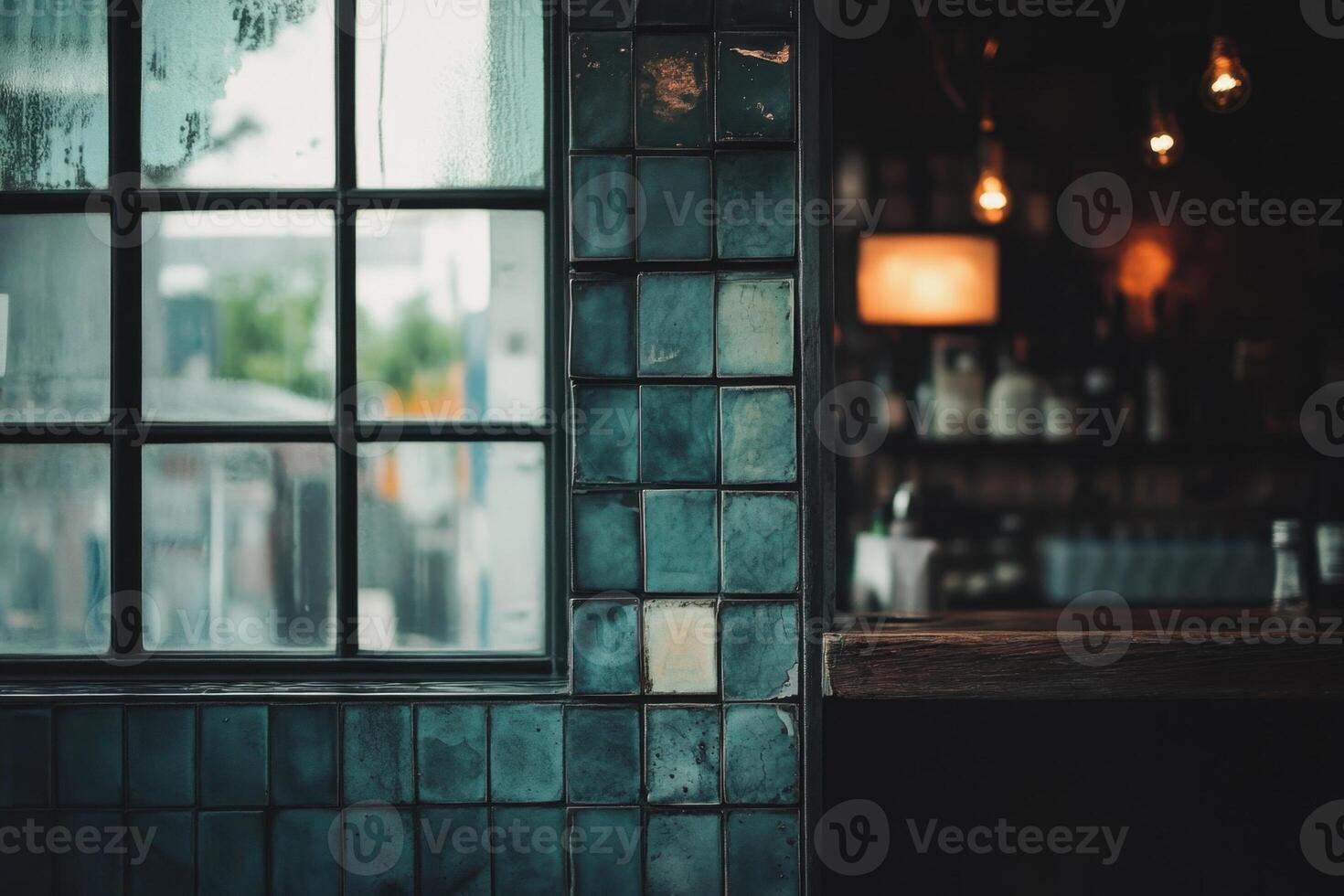 A window with a blue tile wall and a bar photo