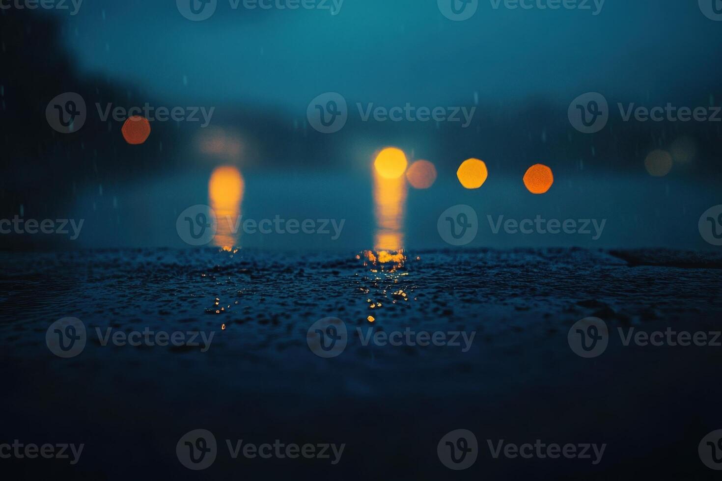 Rainy night with lights on the water photo
