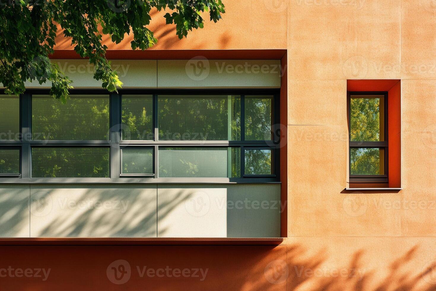 Modern orange building with two windows. photo