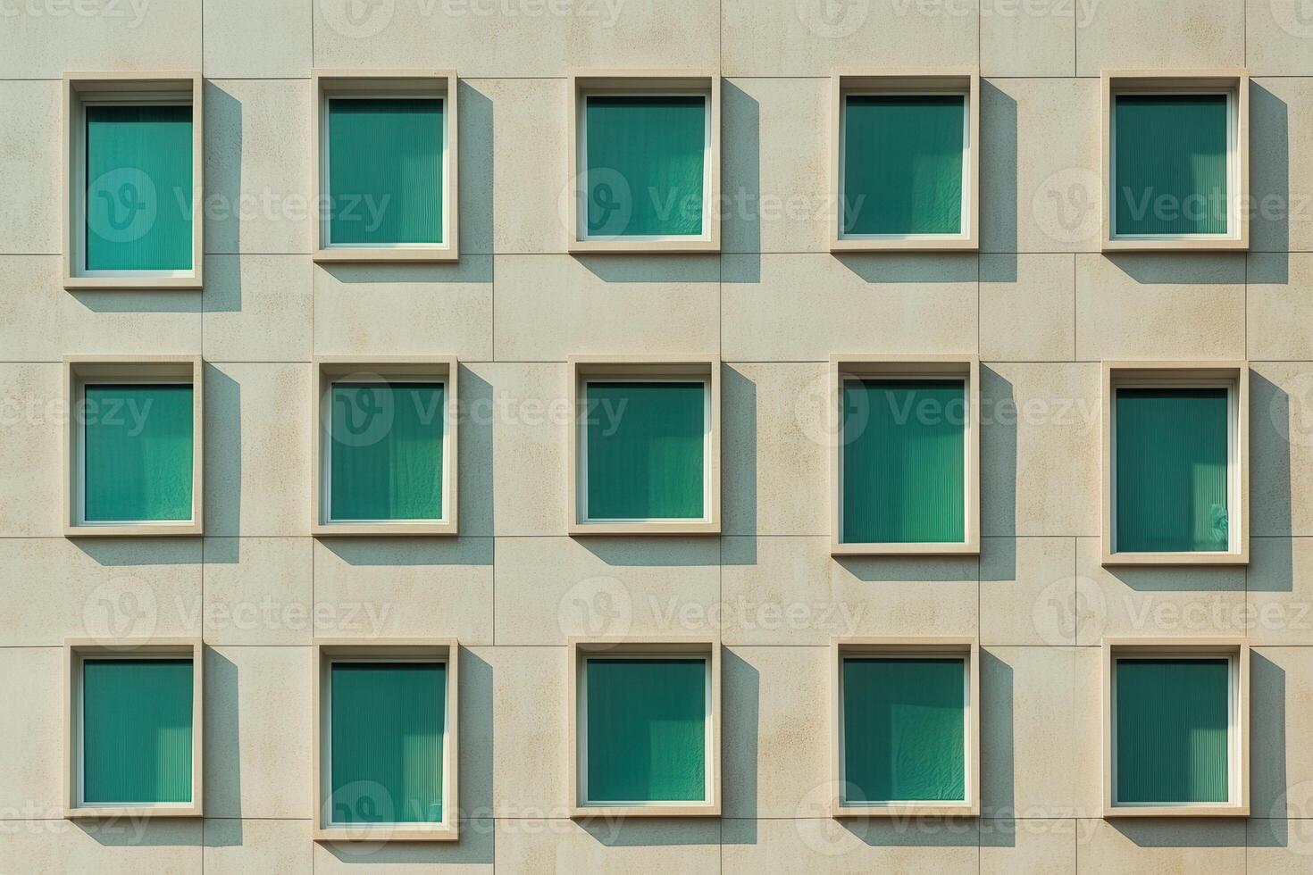 Modern building facade with multiple windows. photo