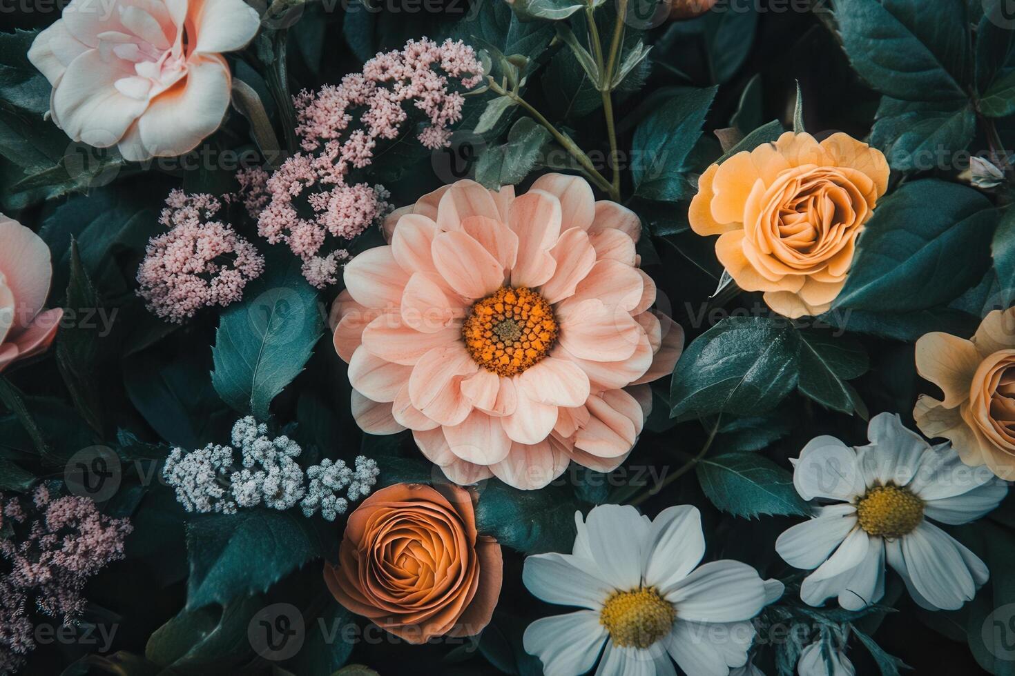 Close-up of a variety of colorful flowers and greenery. photo