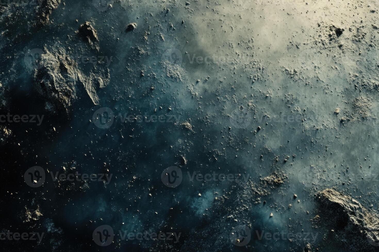 A close-up of a dark, rocky surface with wispy clouds of smoke or gas in the upper right corner. photo
