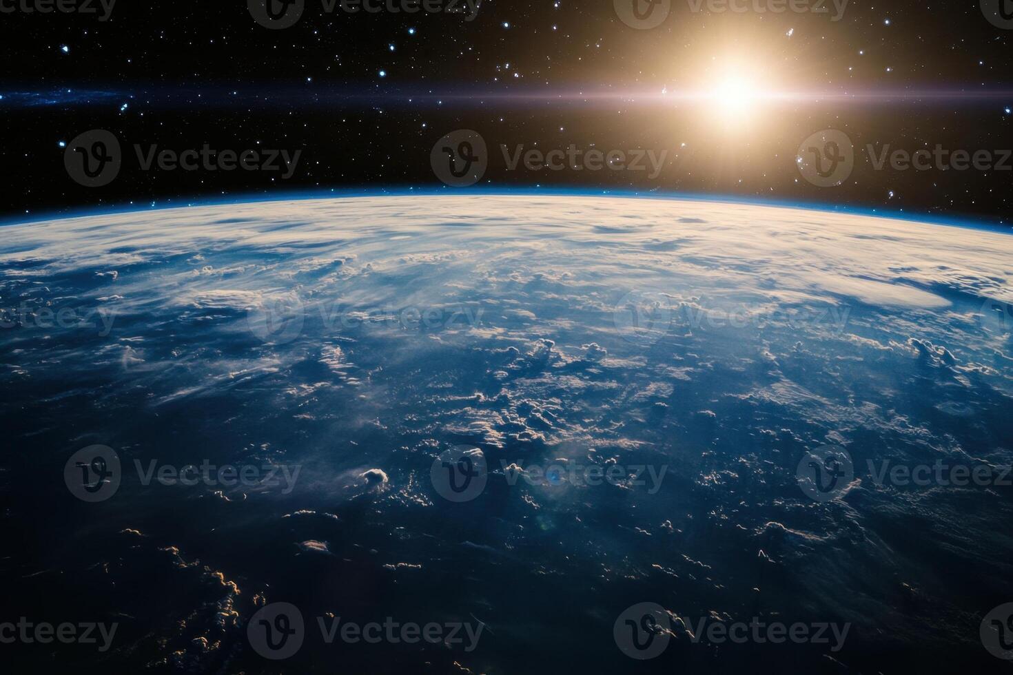 A stunning view of Earth from space with a bright sun rising in the distance, showcasing the planet's beauty and fragility. photo