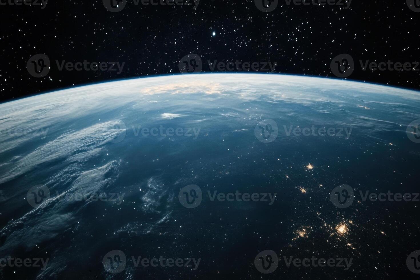 A stunning view of Earth from space, with a deep blue ocean and a starry sky. photo