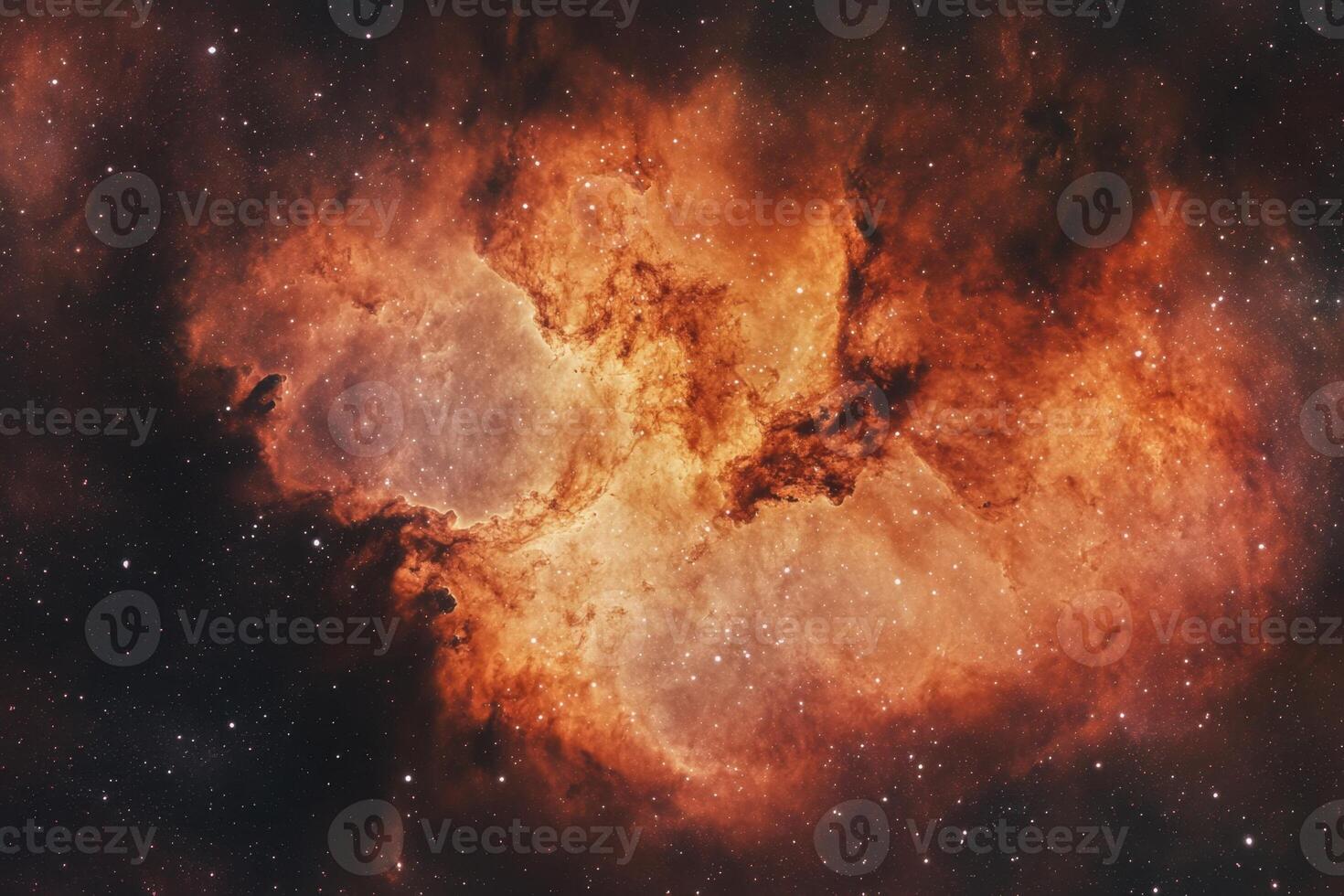 A vibrant nebula with swirls of orange and yellow against a backdrop of twinkling stars. photo