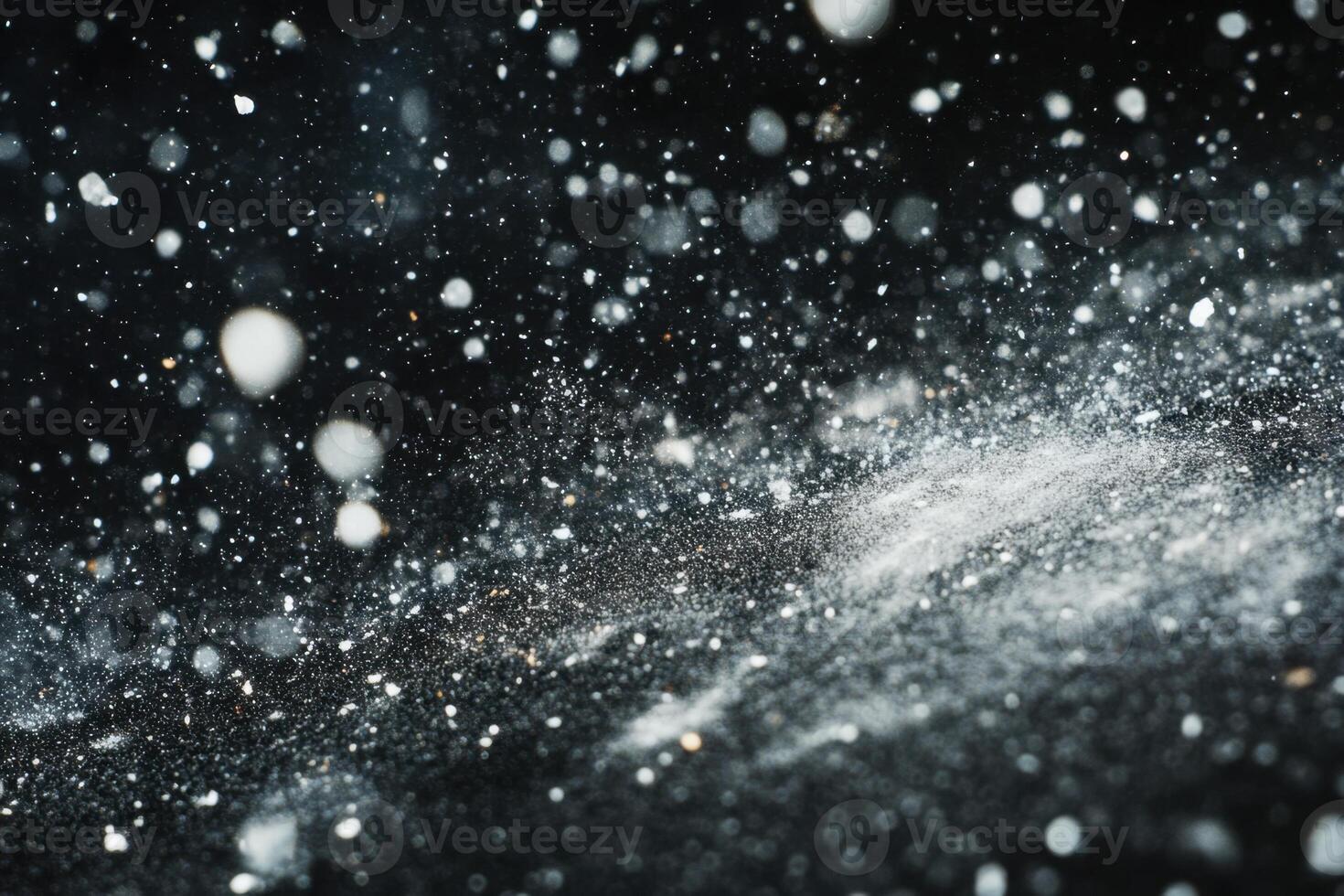 Abstract snow falling on a dark background. photo