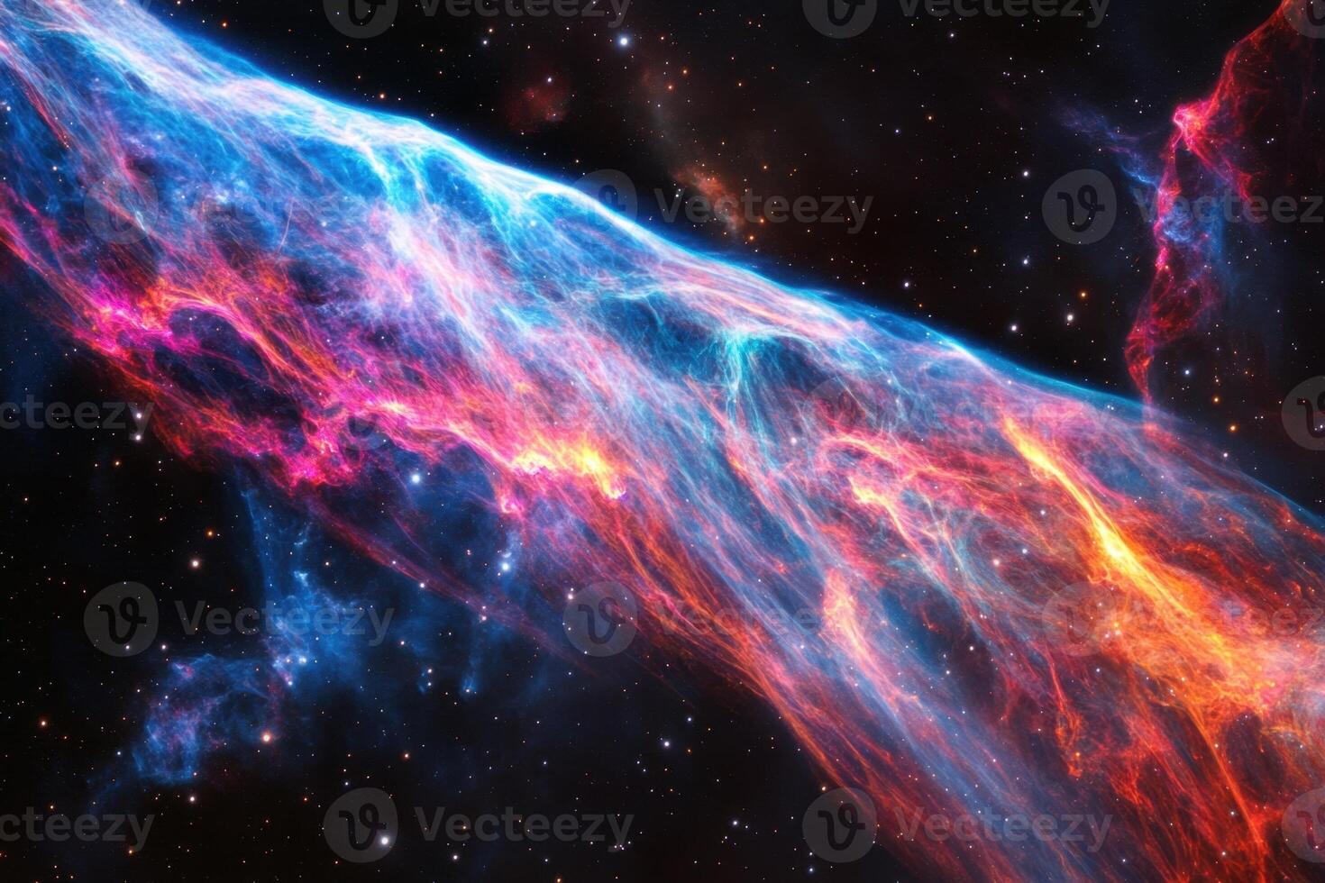 A vibrant nebula of red, blue, and yellow gas stretches across a black starry sky. photo