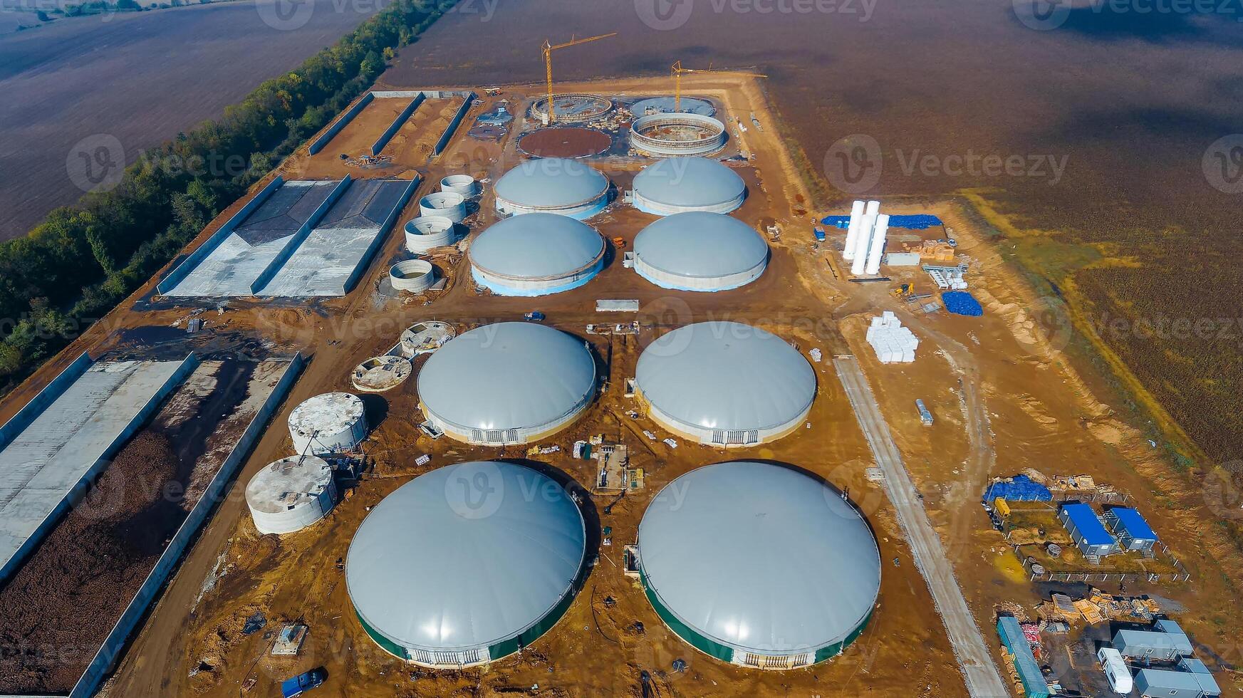 Oil metal huge tanks aerial shot. Big round storages field. photo