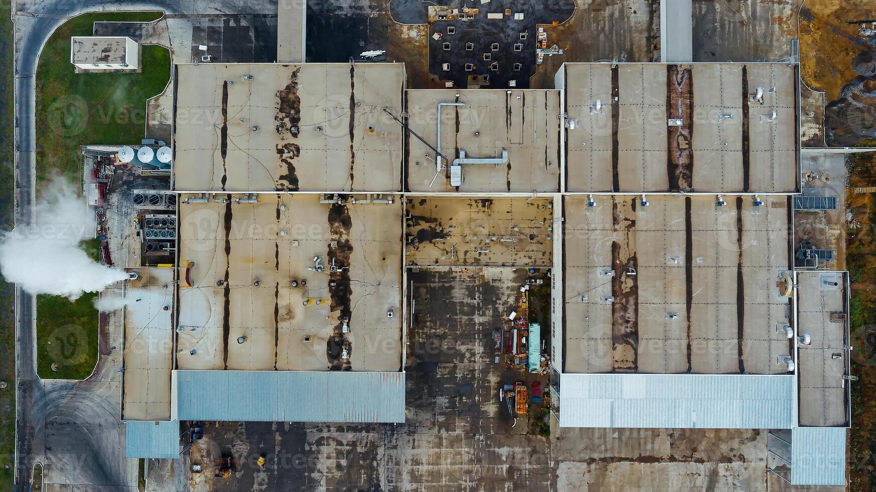 Warehouse factory construction. Big industrial factory aerial view. photo