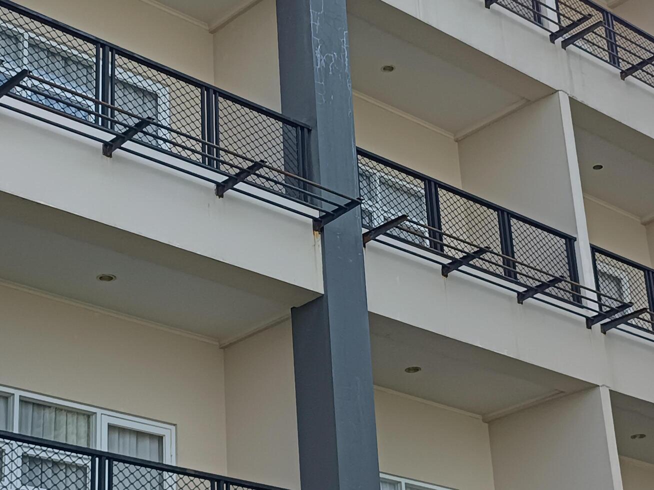 Balcony with Steel Railings and Structural Support photo