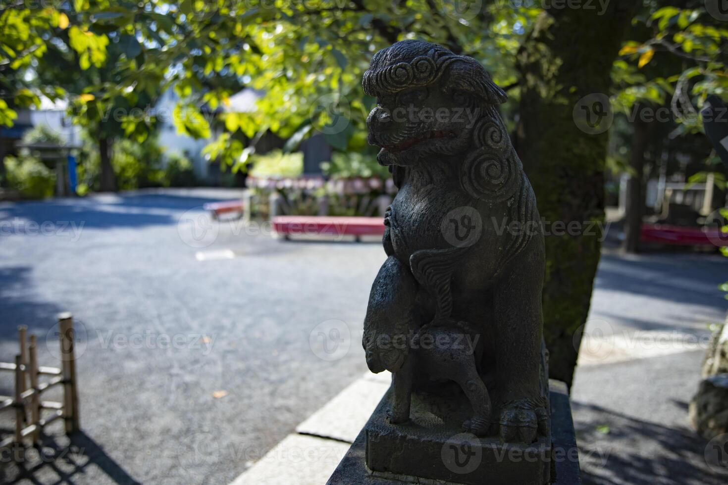 A statue of guardian dog KOMAINU at Nanasha shrine in Tokyo photo