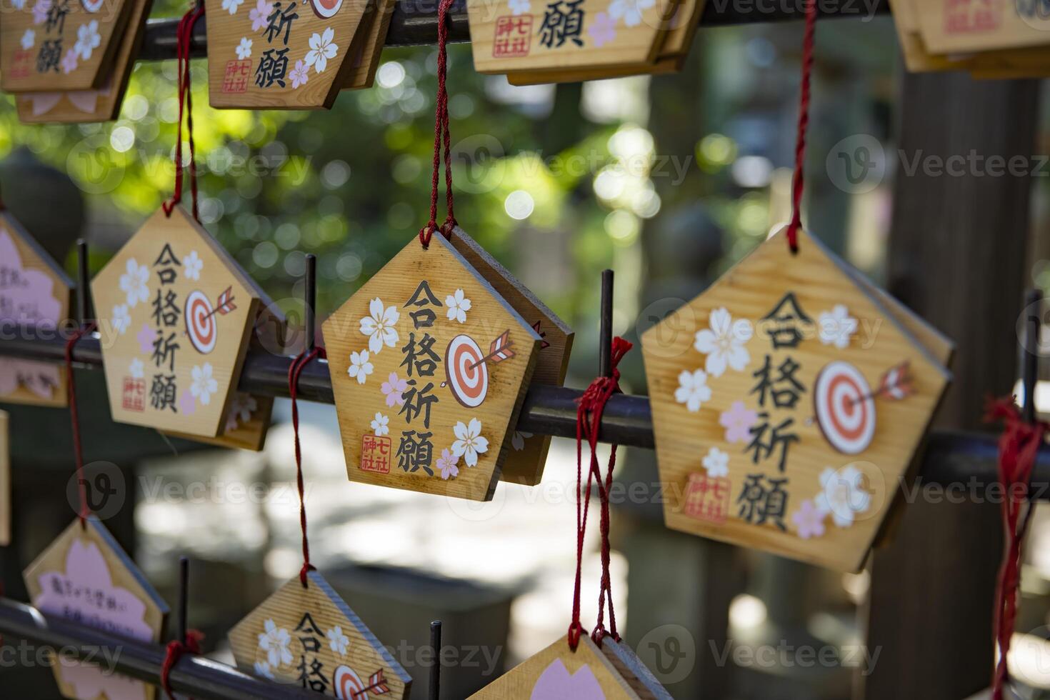 A votive tablet at Nanasha shrine in Tokyo front blur photo