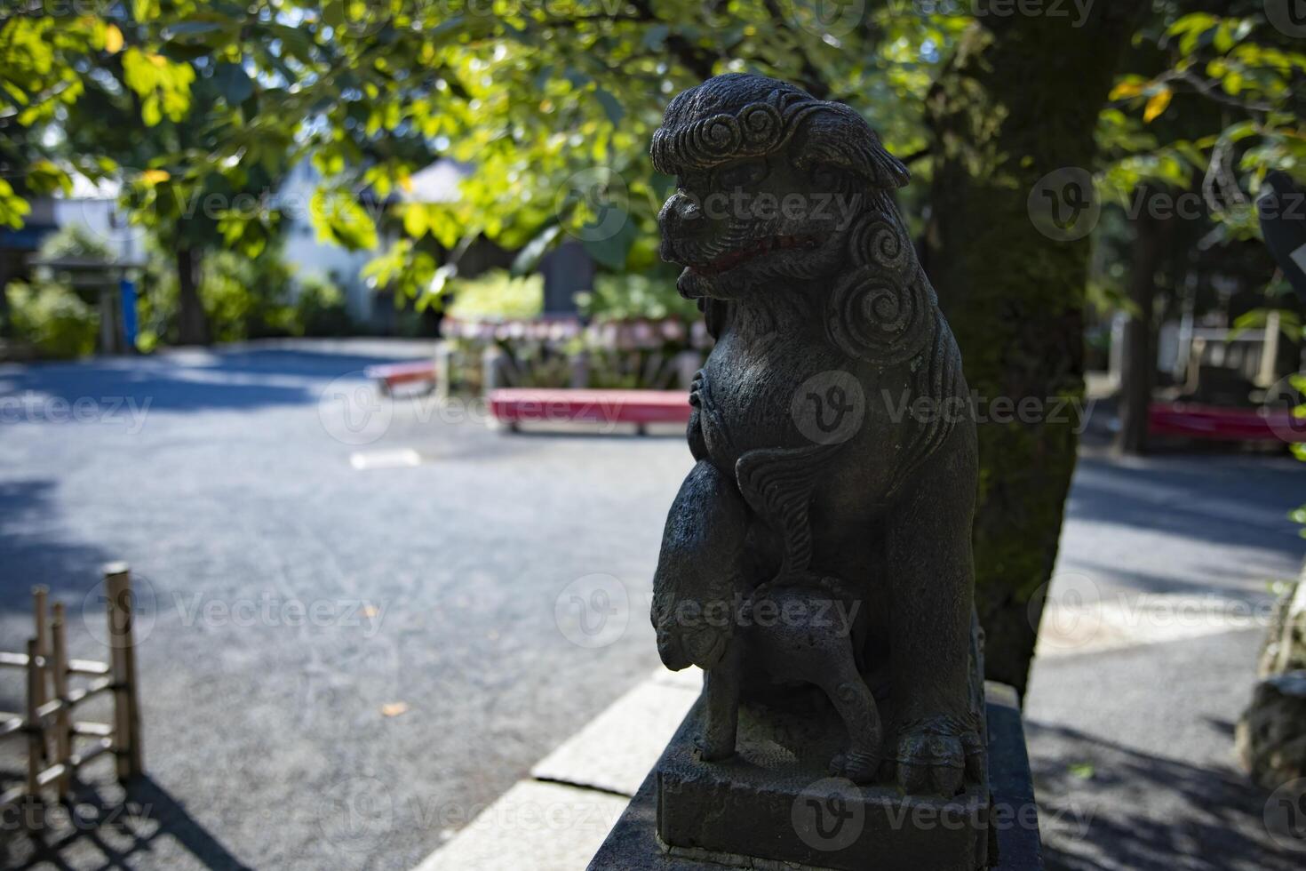 A statue of guardian dog KOMAINU at Nanasha shrine in Tokyo photo