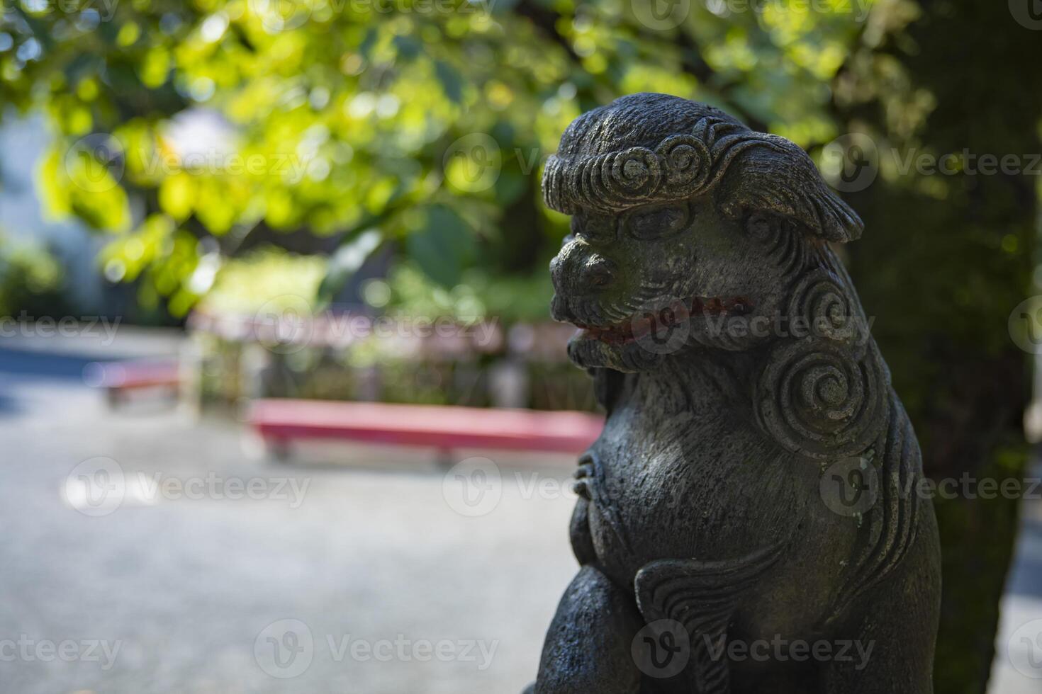 A statue of guardian dog KOMAINU at Nanasha shrine in Tokyo photo