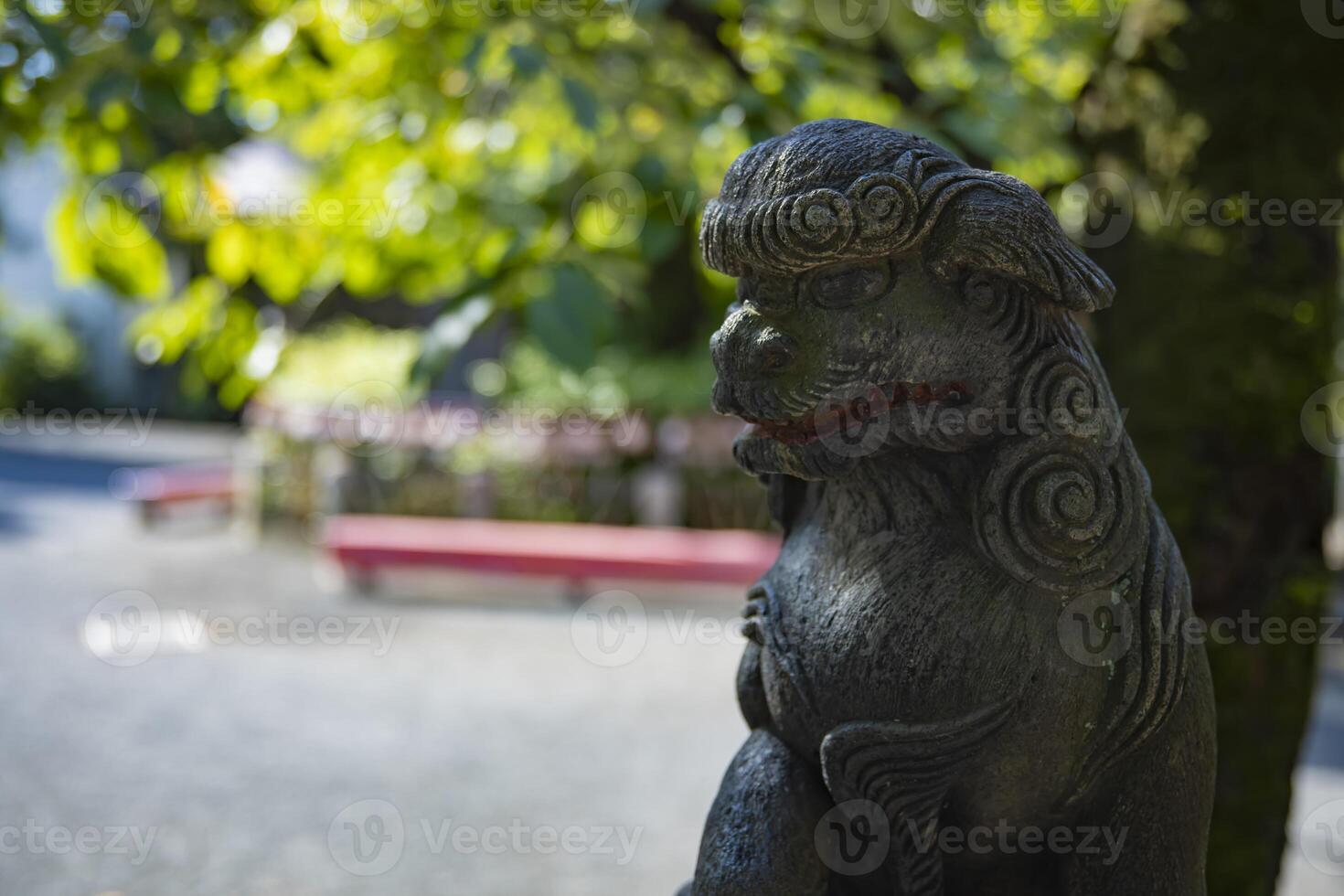 A statue of guardian dog KOMAINU at Nanasha shrine in Tokyo photo