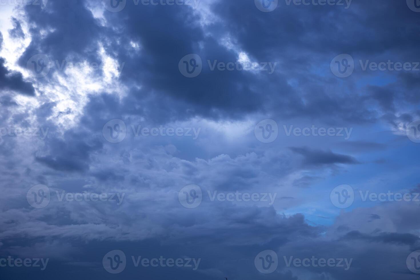 A cloud in the blue sky wide shot photo