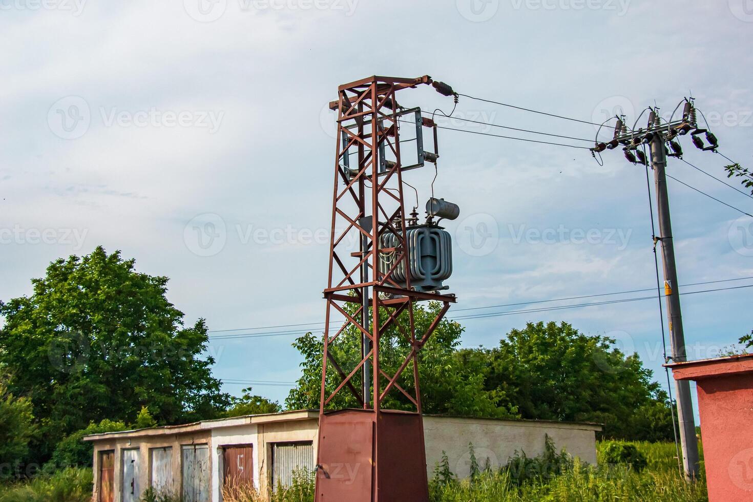 Medium voltage power tower and transformer substation. Used by small consumers and small industry. photo