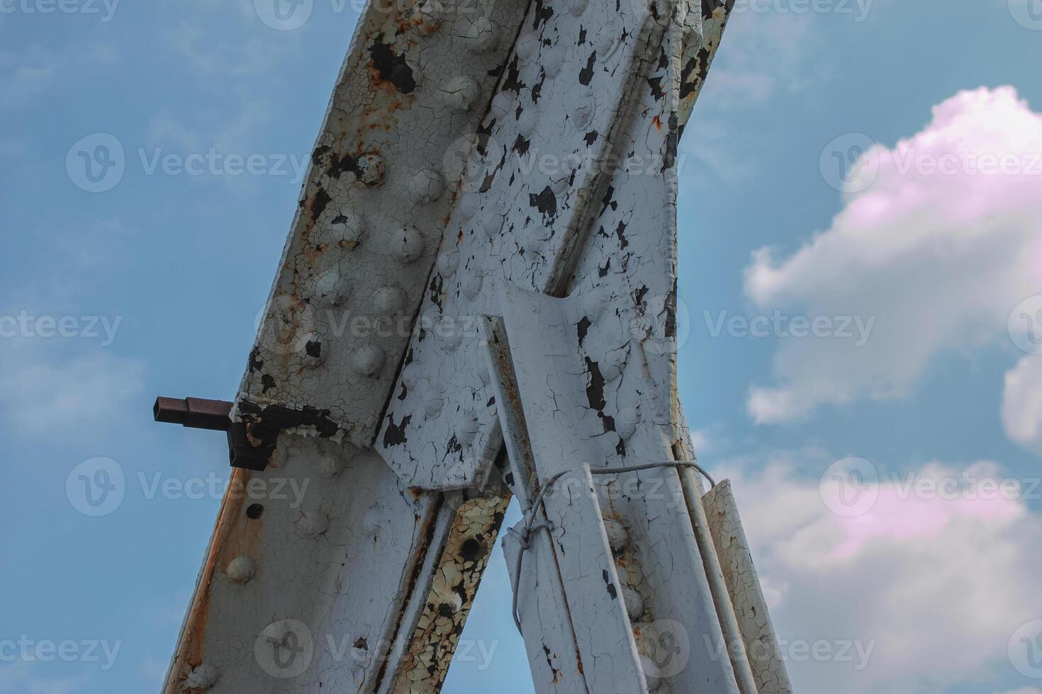 Structural elements of the old pedestrian bridge built in the USSR across the Dnieper River. photo