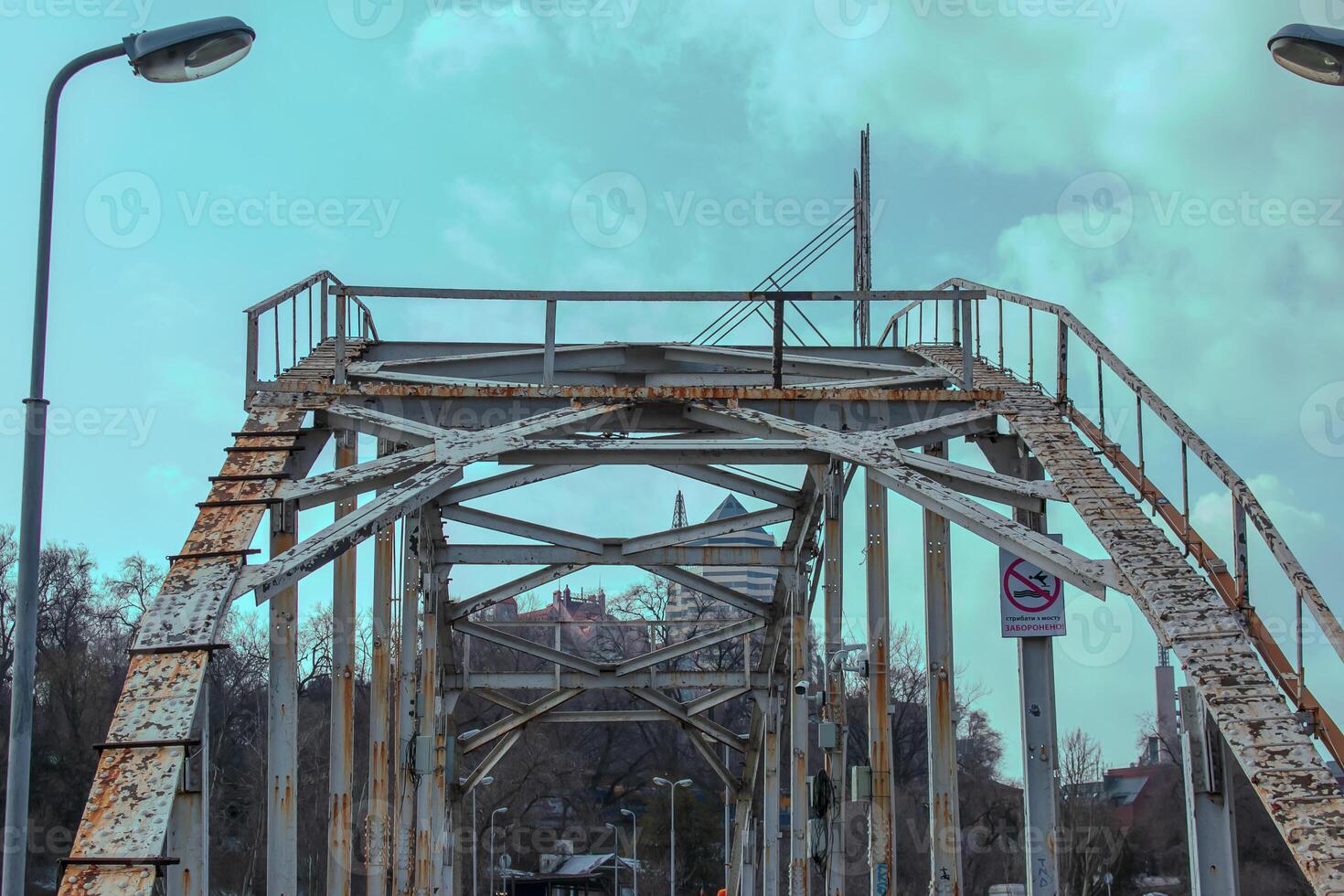 Structural elements of the old pedestrian bridge built in the USSR across the Dnieper River. photo