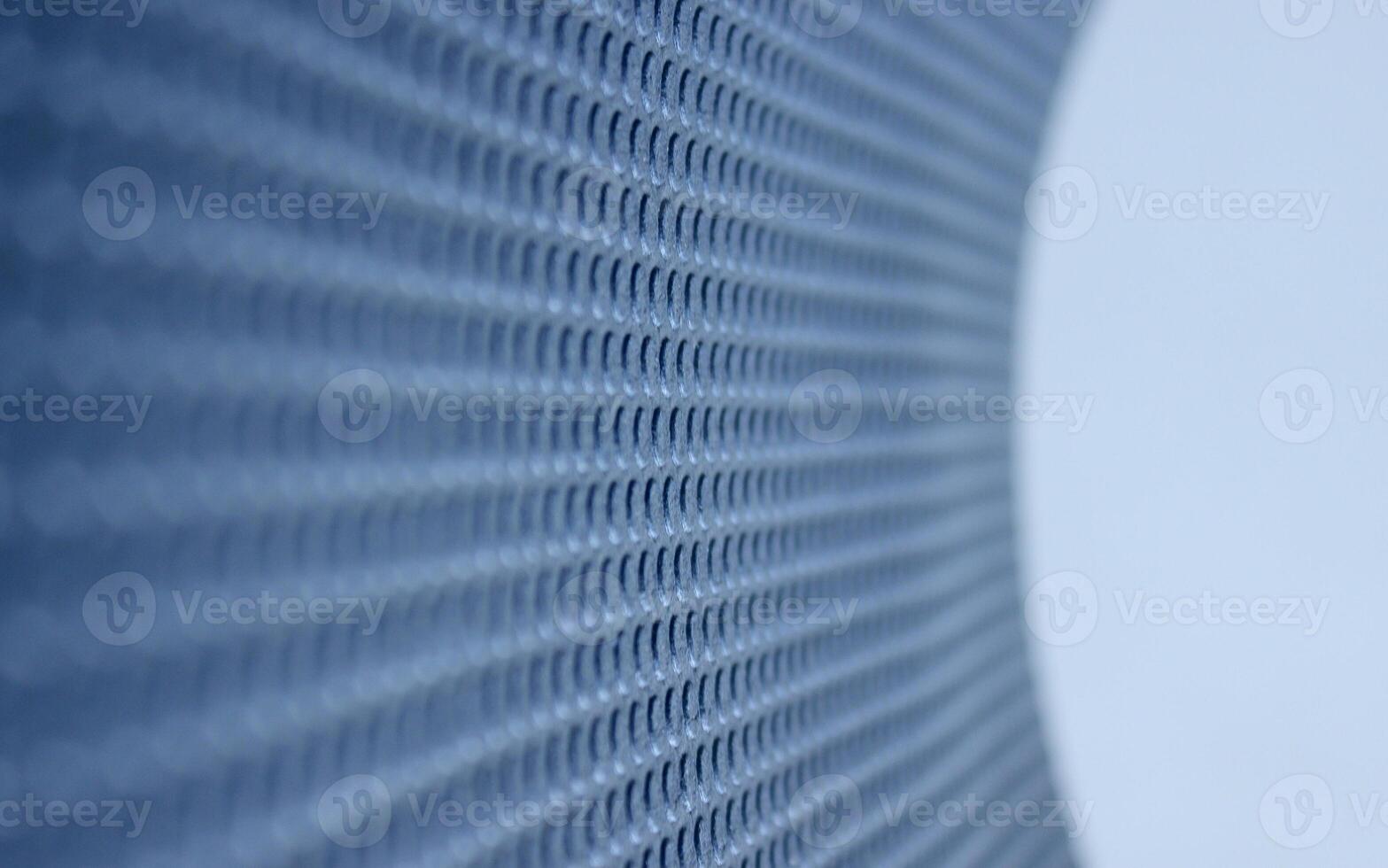 Rolled sheet of shockproof material with extruded round texture. Abstract 3d background of blue textured surface photo
