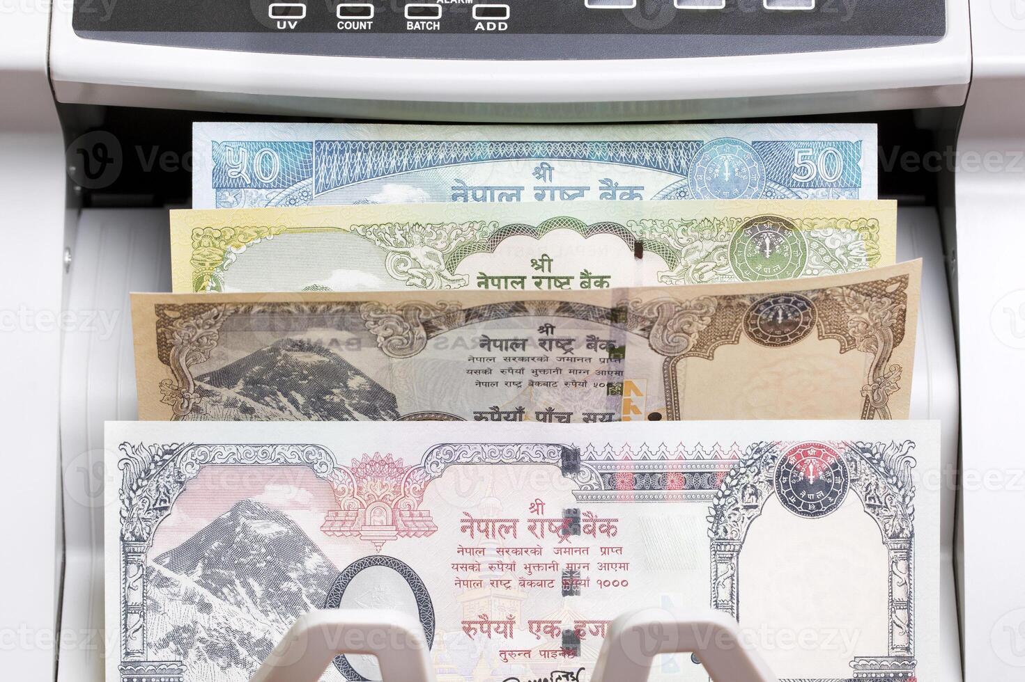 Nepalese rupee in the counting machine photo