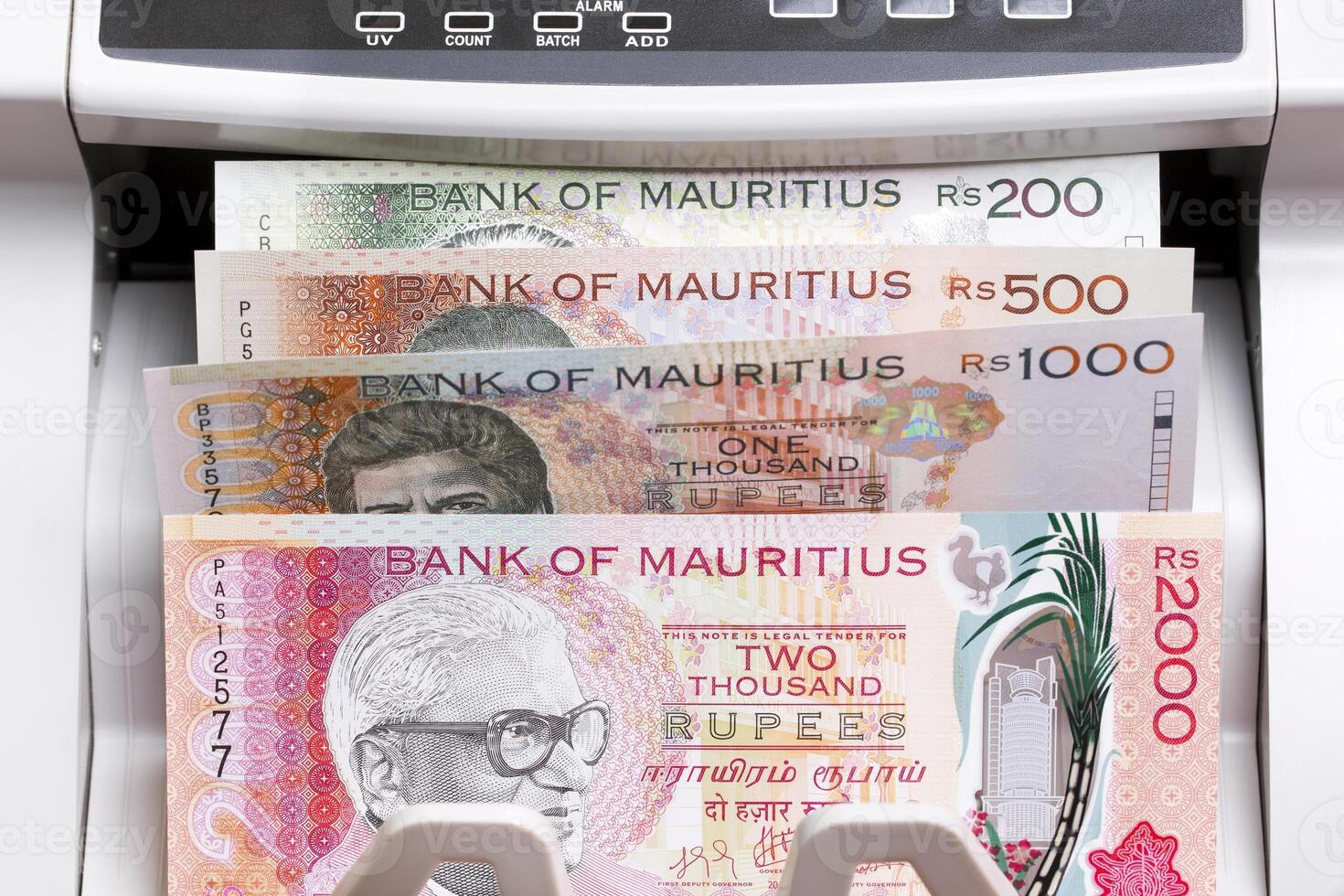 Mauritian rupee in the counting machine photo