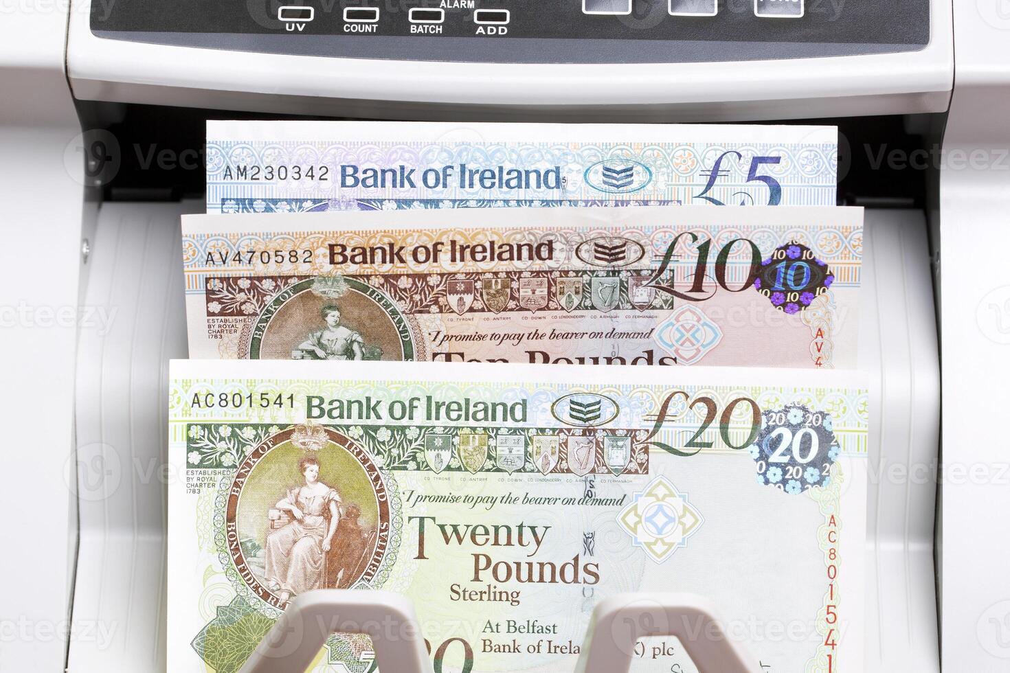 Irish pound in the counting machine photo
