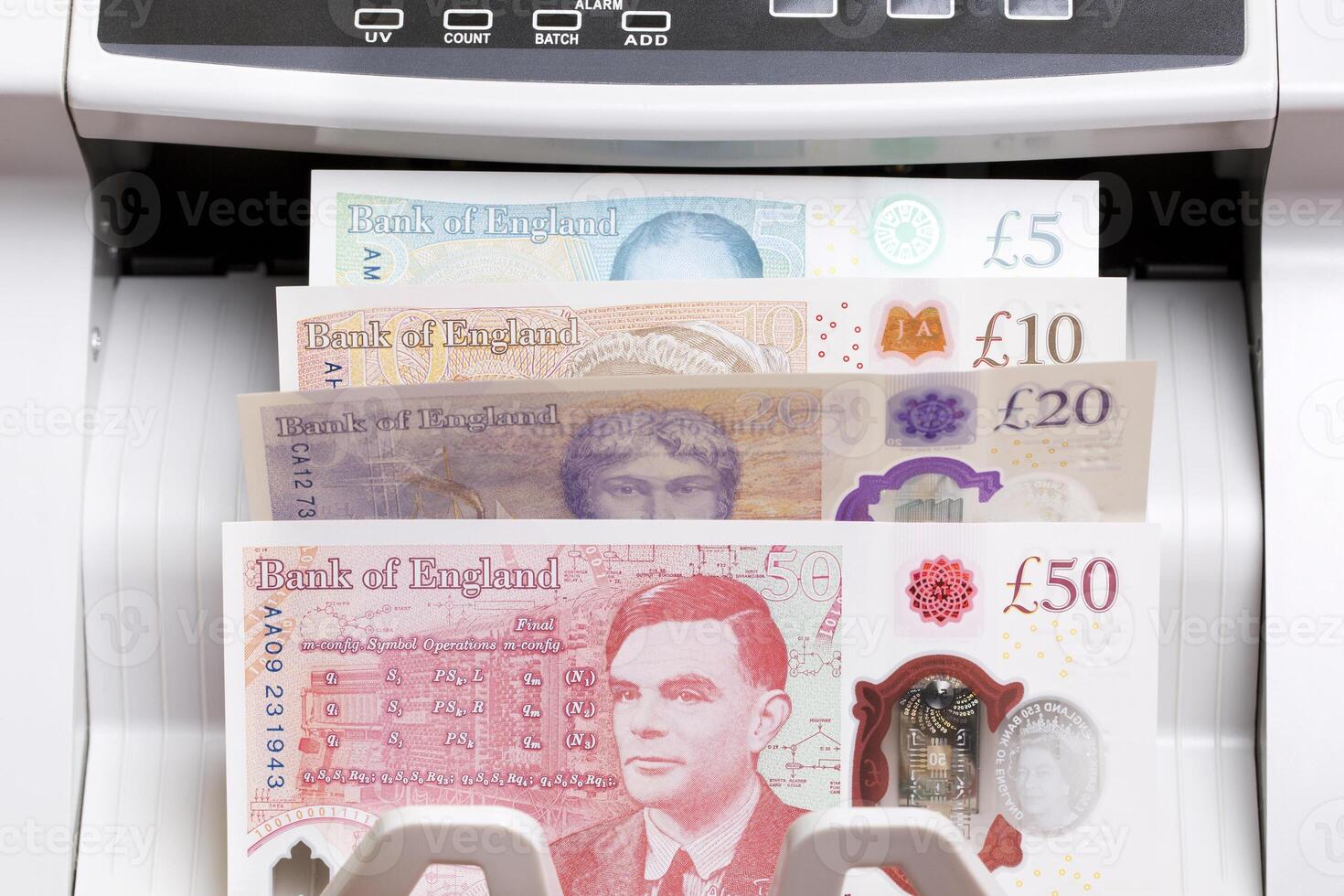 British pound in the counting machinej photo