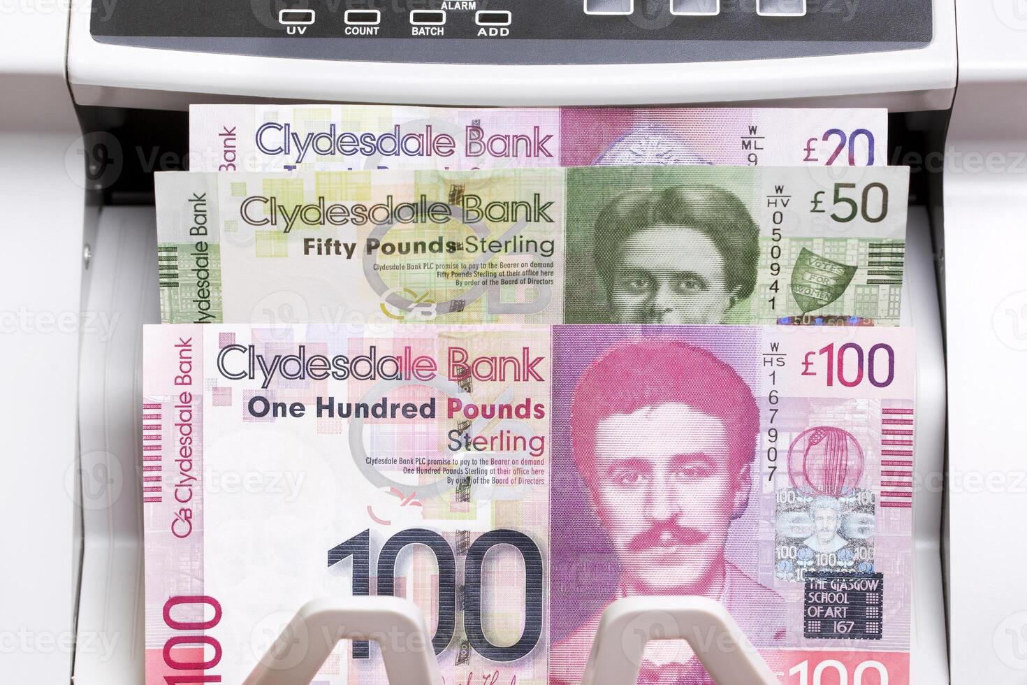 Scottish pound in the counting machine photo