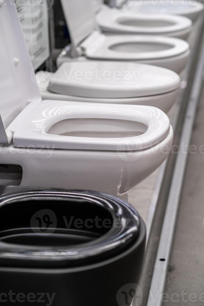 Automotive store showcasing a row of toilets for sale photo