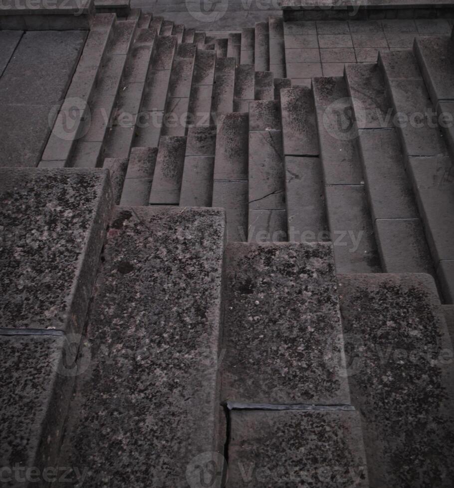 Staircase pattern with concrete steps provide a striking and textured background that is perfect for various design projects, presentations and artistic creations a perfect background. photo