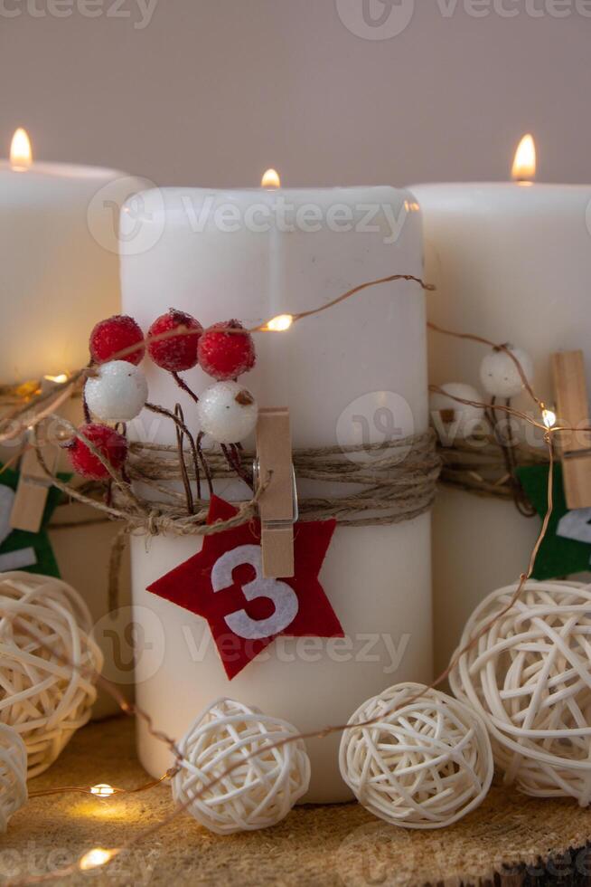 Traditional four advent weeks calendar before Christmas holidays. Candles and plastic free zero waste sustainable decoration. Copy space greeting card mock up template. Winter cozy home time photo