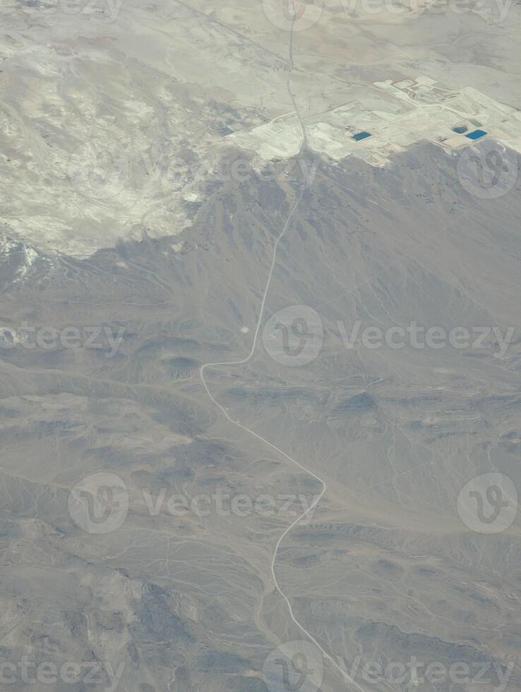 Airplane view. Mojave Desert. Small towns, roads and fields. Scenic view from above on the ground photo