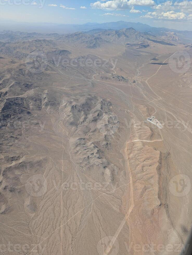 Airplane view. Mojave Desert. Small towns, roads and fields. Scenic view from above on the ground photo