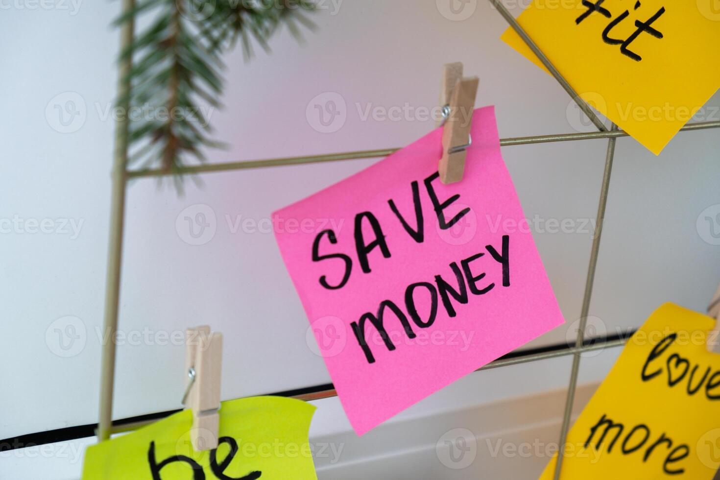 SAVE MONEY financial goal on Dream board promises and aims. Preparation for new year new life new me. Visualizing wish list for 2025. Dreams plan action resolutions for coming year. Inspirational self improvement concept photo