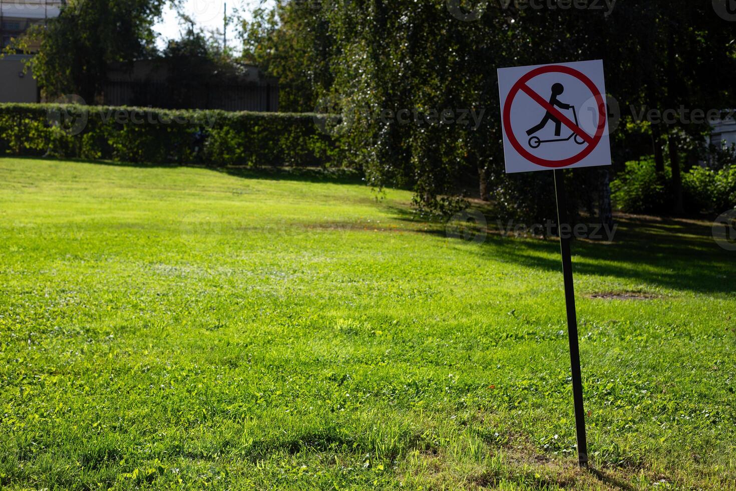 Special sign for rules in public park prohibiting riding electric scooters. Traffic regulation on the streets of a modern city. No allow scooter photo