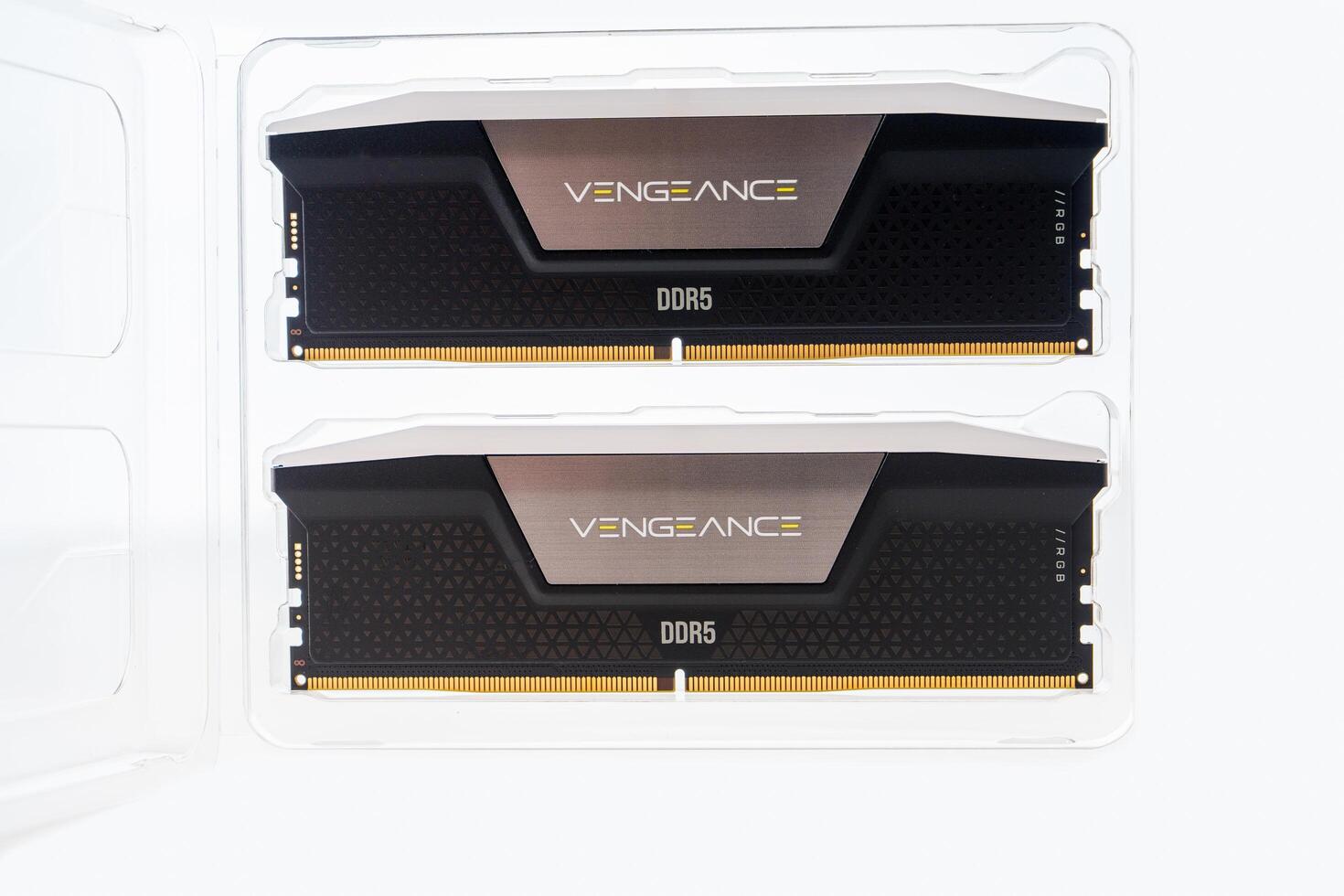 December 2023, Tallinn, Estonia. Corsair. Two high-performance black and silver computer memory modules are isolated on a clean white background. The modules are labeled with Vengeance DDR5, showcasing their advanced technology and design. photo
