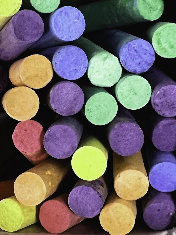 Colorful chalks stacked together,art stationary photo